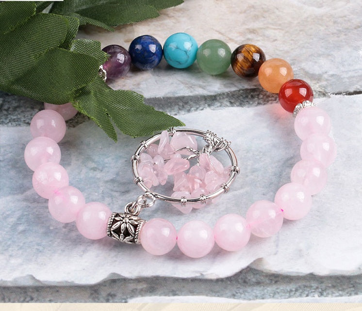 Pulsera de Cuarzo Rosa con 7 Chakras — Equilibrio Energético y Estilo Natural