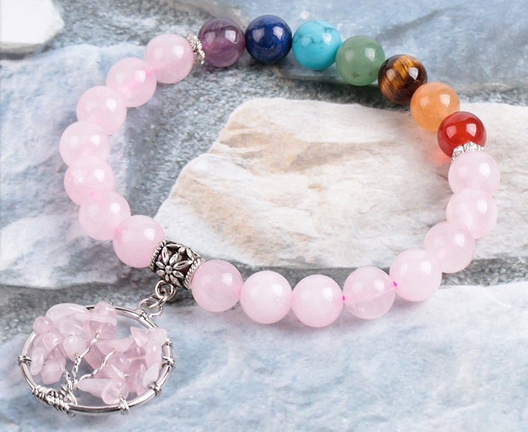 Pulsera de Cuarzo Rosa con 7 Chakras — Equilibrio Energético y Estilo Natural