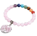 Pulsera de Cuarzo Rosa con 7 Chakras — Equilibrio Energético y Estilo Natural