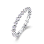 Anillo Eternity con Moissanitas Redondas — Brillo Tipo Diamante en Plata