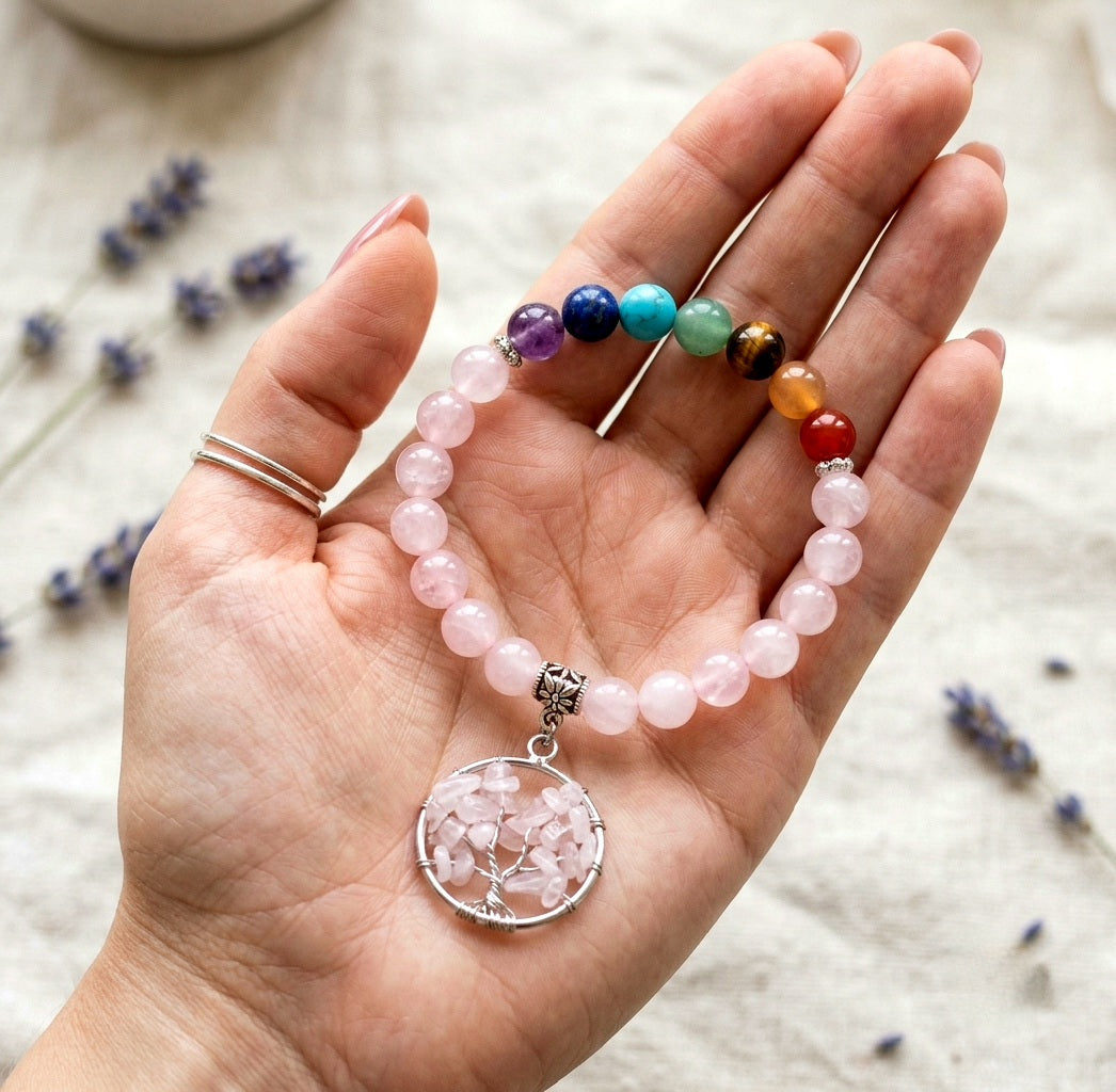 Pulsera de Cuarzo Rosa con 7 Chakras — Equilibrio Energético y Estilo Natural